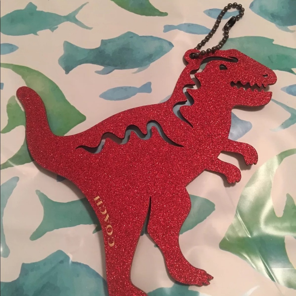 Coach Rexy Dinosaur Orange sparkle hang tag